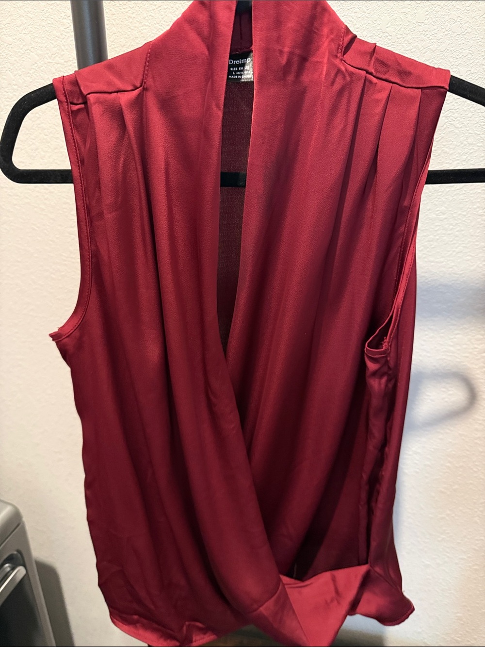 Draped Sleeveless V-Neck Blouse in Wine by Dreamgirl